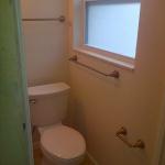 NEW TOILET AND VINYL SINGLE HUNG REPLACEMNT WINDOW WITH MARBLE SILL
