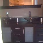 FRONT VIEW OF NEW VANITY CONTEMPORARY LOOK GLASS TOP